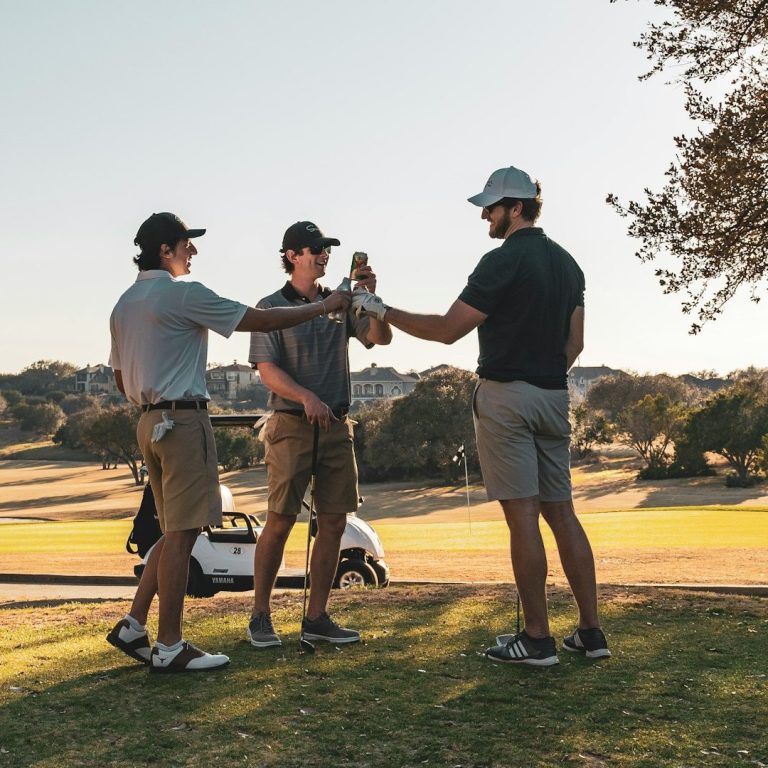 Prvate Wine Tours Outdoor dining setup with wooden tables, floral centerpieces, and elegant place settings.